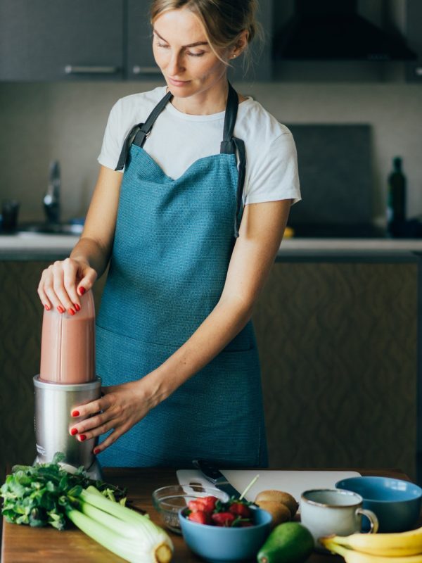 young-wellness-woman-preparing-a-nutritious-healthy-breakfast-in-her-kitchen--q52s5e664eqfhi4zse1k4yo1u7nk0olqufkg05k0n4